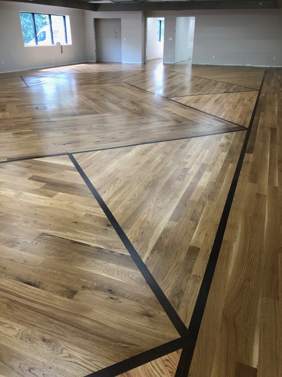 Freshly sanded hardwood floor ready for finish
