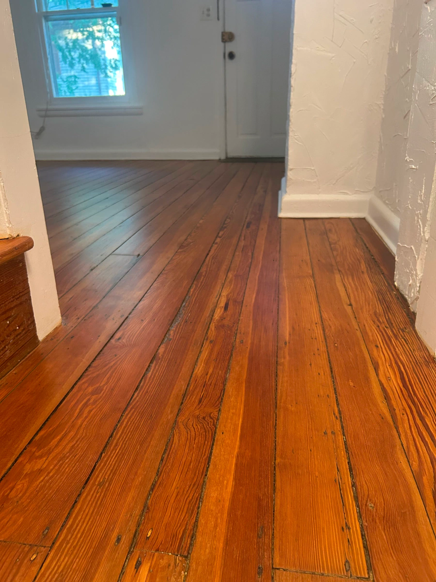 Large format porcelain tile floor installed by Hardwood Kings